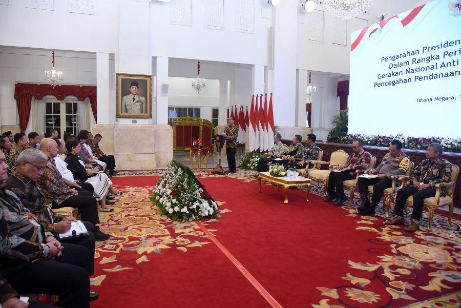 Momen Presiden Jokowi di Peringatan 22 Tahun Gerakan Nasional APU PPT. (Foto/setkab)