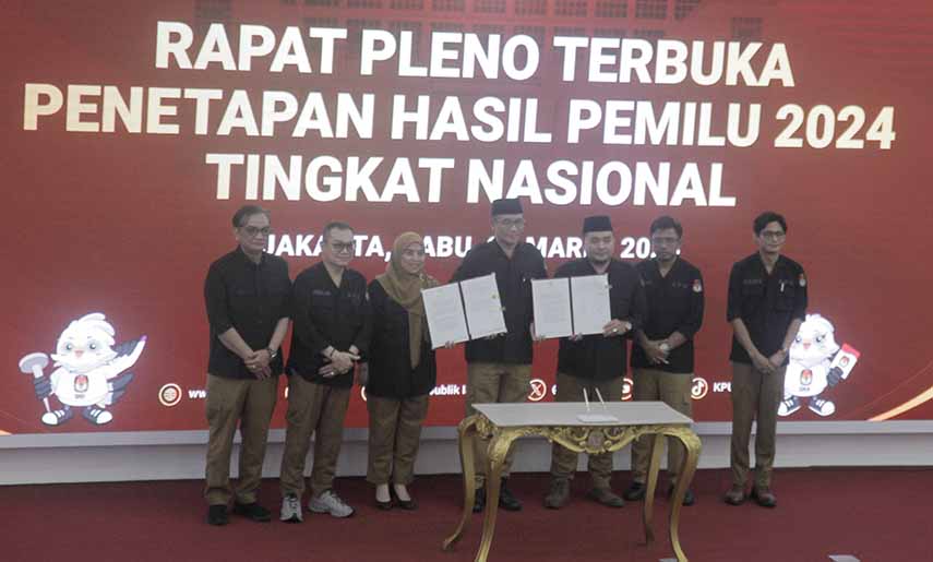 KPU membacakan berita acara penetapan hasil penghitungan perolehan suara Pemilu 2024 tingkat nasional di Gedung KPU, Jakarta, Rabu (20/3/2024). (BeritaNasional/Oke Atmaja)