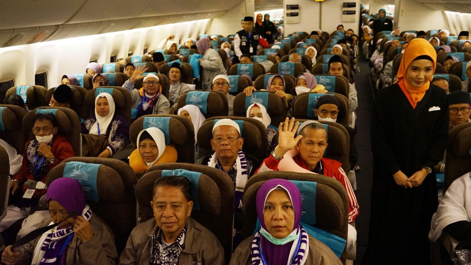 Jemaah haji yang terbang menggunakan Garuda Indonesia. (Foto/Garuda Indonesia)