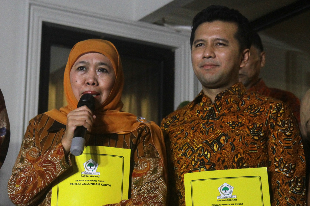 Khofifah Indar Parawansa (kiri) dan Emil Dardak (kanan). (BeritaNasional/Oke Atmaja)