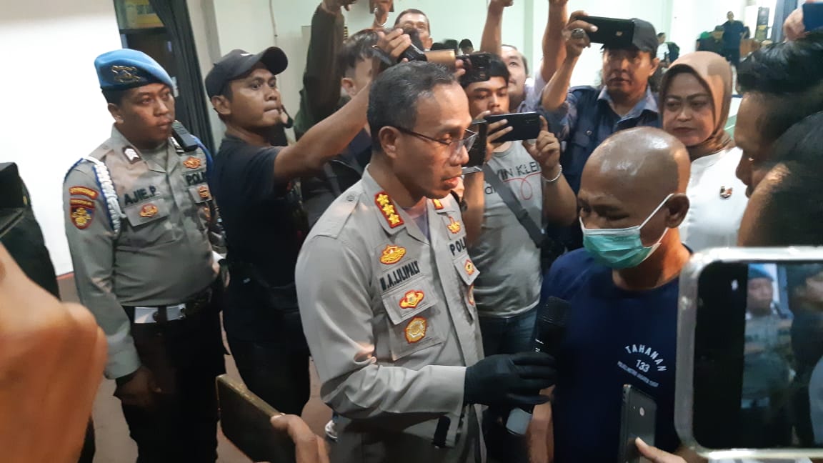 Pelaku penculikan dan pencabulan terhadap bocah, Indra Jaya (kanan), di Jakarta Selatan. (Foto/Istemawa)