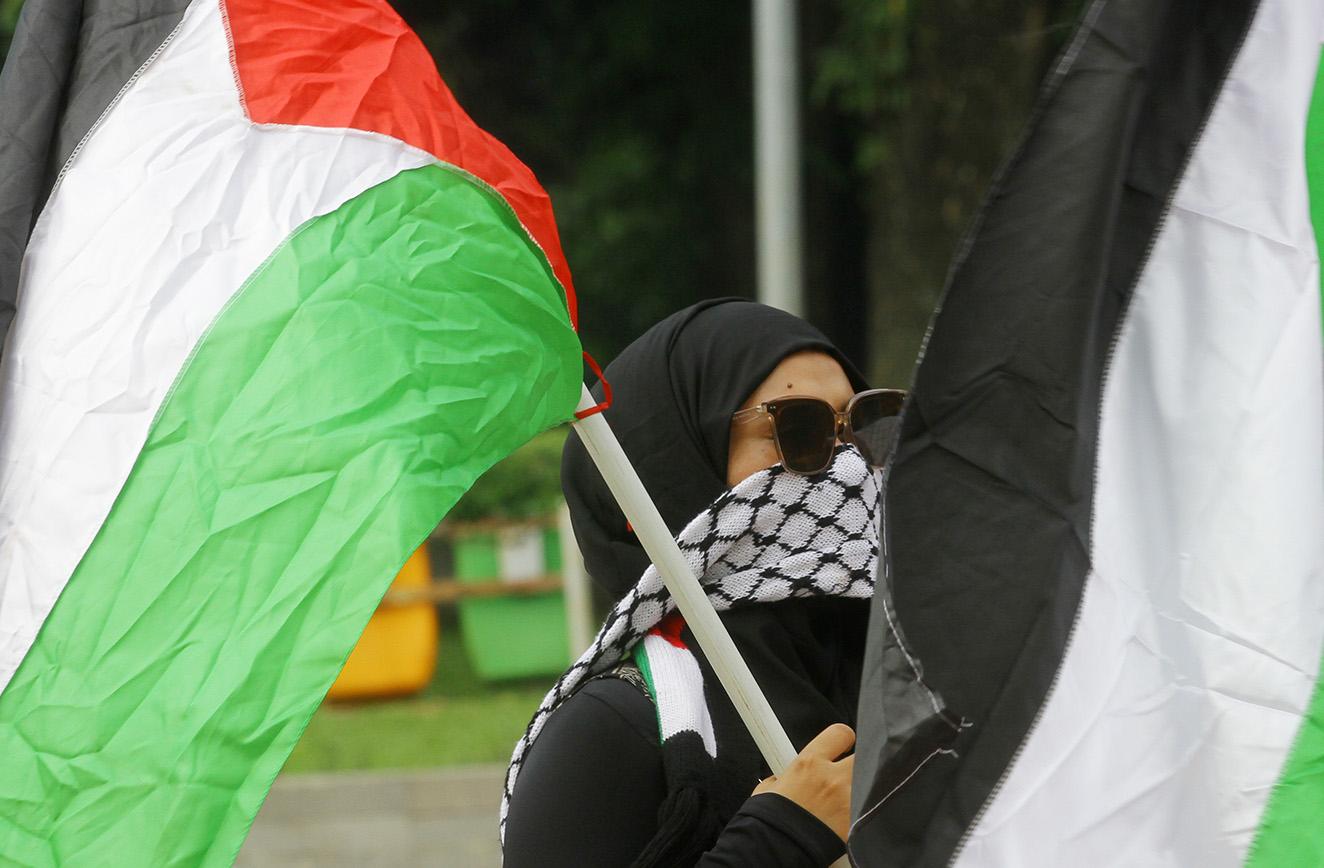 Massa dari Komite Solidaritas Palestina menggelar aksi bela Palestina di Tugu Proklamasi,Jakarta, Sabtu (15/6/2024). (BeritaNasional.Com/Oke Atmaja)