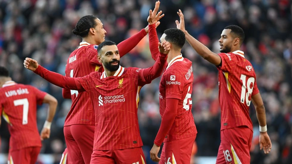 Para pemain Liverpool merayakan gol kemenangan. (Foto/liverpoolfc.com)