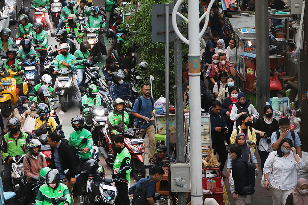 Aktivitas pengemudi ojek online di kawasan Jakarta. (BeritaNasional/Elvis Sendouw)