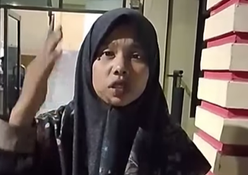 Halimah Tusadiyah (HT) guru mengaji yang melaporkan peredaran narkoba di Sumatera Utara. (BeritaNasional/tangkapan layar)