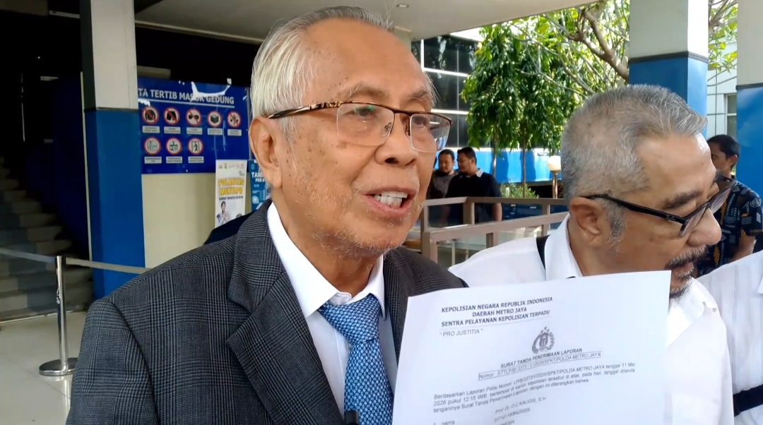 Pengacara Otto Cornelis Kaligis melapor ke Polda Metro Jaya. (BeritaNasional/Bachtiarudin)