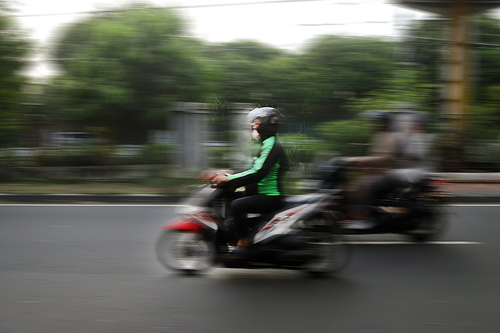 1,7Juta Pengemudi Ojol Belum Terlindungi BPJS Ketenagakerjaan Aktivitas pengemudi ojek online di kawasan Jakarta. (BeritaNasional/Elvis Sendouw)