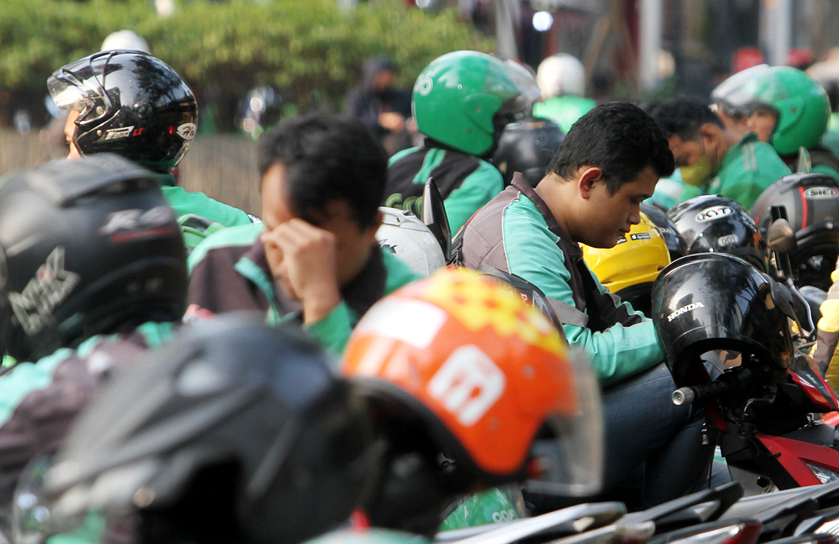 Pengemudi ojek online menunggu penumpang di Kawasan Sasiun Sudirman, Jakarta, Rabu (4/9/2024).(BeritaNasional.com/ Oke Atmaja)