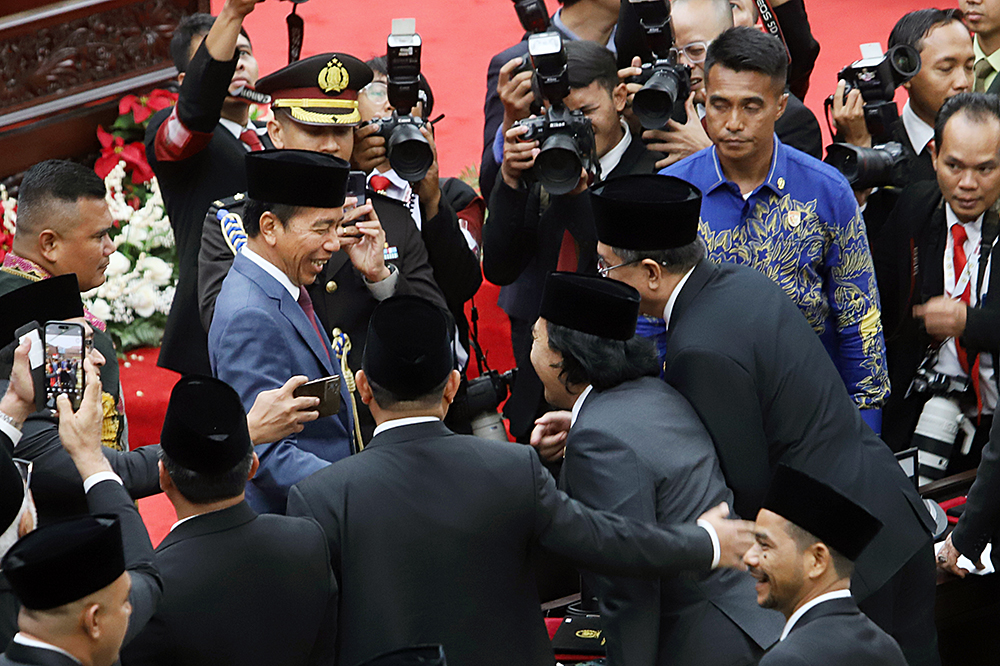 Presiden Joko Widodo (Jokowi) menghadiri pelantikan 580 anggotam dewan periode 2024 - 2029.. (BeritaNasional/Elvis Sendouw)