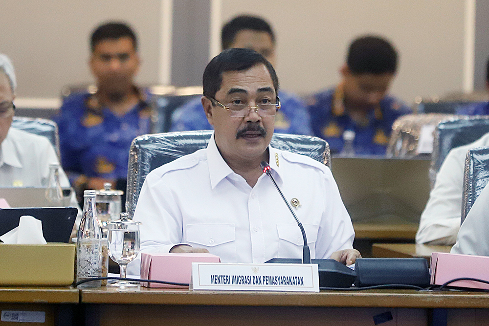 Menteri Imigrasi dan Permasyarakatan Agus Andrianto memberikan penjelasan dalam rapat kerja bersama Komisi XIII DPR. (BeritaNasional/Elvis Sendouw)