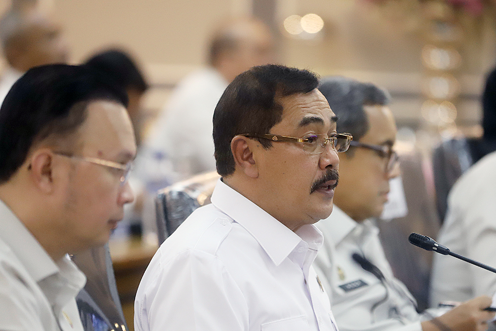 Menteri Imigrasi dan Permasyarakatan Agus Andrianto memberikan penjelasan dalam rapat kerja bersama Komisi XIII DPR. (BeritaNasional/Elvis Sendouw)