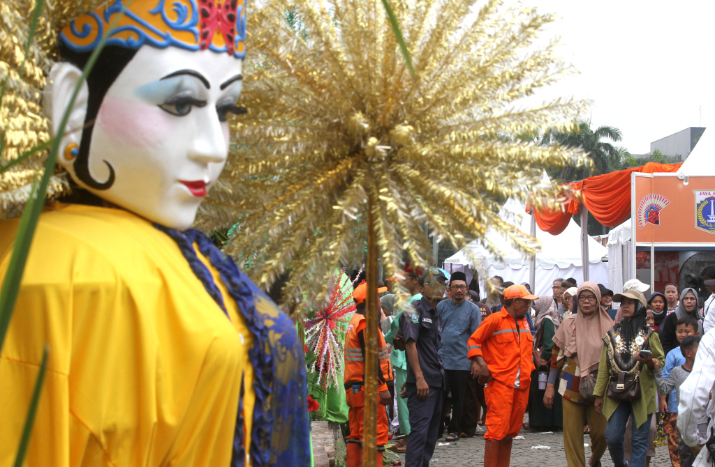 Ramaikan Lebaran Betawi, Warga Padati Monas Suasana lebaran Betawi di Monumen Nasional, Jakarta, Sabtu (26/4/2025).(Berita nasional.com/Oke Atmaja)