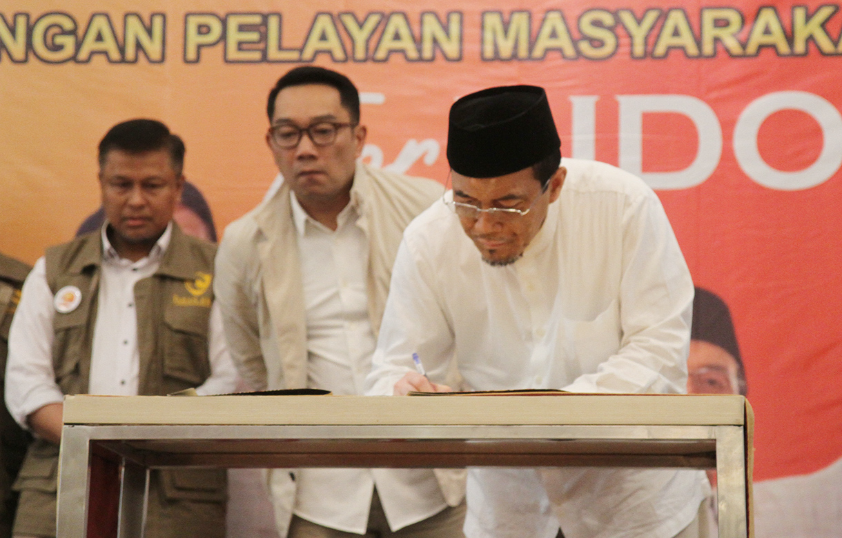 Pasangan bakal calon Gubernur dan bakal calon Wakil Gubernur DKI Jakarta Ridwan Kamil dan Suswono saat deklarasi relawan Jaringan Pelayan Masyarakat (Jaran Emas) di Jakarta, Minggu (16/9/2024). (BeritaNasional.com/ Oke Atmaja)