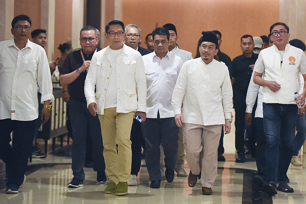 Pasangan Cagub dan Cawagub nomor urut satu, Ridwan Kamil-Suswono memberikan keterangan terkait hasil hitung cepat Pilkada Jakarta. (BeritaNasional/Elvis Sendouw)