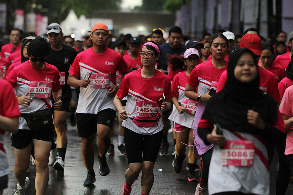 Pelari antusias mengikuti Smartfren Run 2024. (BeritaNasional/HO/Elvis Sendouw)